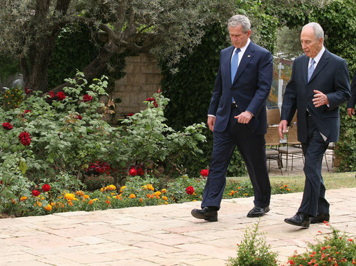 President George W. Bush and President Shimon Peres of Israel walk during their visit Wednesday, May 14, 2008, at the Jerusalem residence of President Peres. White House photo by Joyce N. Boghosian