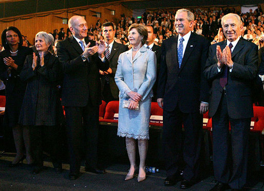 President George W. Bush and Laura Bush are applauded as they attend the Israeli Presidential Conference 2008 at the Jerusalem International Center in Jerusalem, Wednesday, May 14, 2008, during a celebration in honor of the nation's 60th anniversary. From left are U.S. Secretary of State Condoleezza Rice, Mrs. Aliza Olmert, Israeli Prime Minister Ehud Olmert, and Israeli President Shimon Peres. White House photo by Joyce N. Boghosian