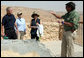 Director Eitan Campbell describes the water system of Masada to President George W. Bush, Mrs. Laura Bush and Mrs. Aliza Olmert, Thursday, May 15, 2008, as they tour the historic fortress built by King Herod of Judea, who ruled from 37 BC to 4 BC and chose the site as a refuge against his enemies and as a winter palace. White House photo by Joyce N. Boghosian