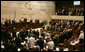 President George W. Bush receives a standing ovation by members of the Knesset Thursday, May 15, 2008, in Jerusalem. Acknowledging the 60th anniversary of Israel’s independence, the President told the Israeli parliament, “Earlier today, I visited Masada, an inspiring monument to courage and sacrifice. At this historic site, Israeli soldiers swear an oath: "Masada shall never fall again." Citizens of Israel: Masada shall never fall again, and America will be at your side.” White House photo by Shealah Craighead
