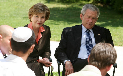 President George W. Bush and Mrs. Laura Bush listen to as a young participant during a roundtable discussion Friday, May 16, 2008, at the Bible Lands Museum Jerusalem. On the topic of peace with the Palestinians, the young student said, “I’m religious, but I want to give the Arabs land,’’ he said. “I feel I have a good life. Why don’t they get a good life too?” White House photo by Joyce N. Boghosian