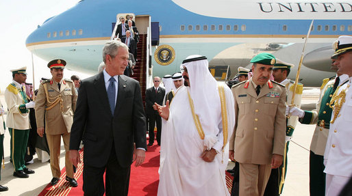 President George W. Bush and King Abdullah bin Abdulaziz walk the red carpet after the arrival Friday, May 16, 2008, of the President and Mrs. Laura Bush to Riyadh. As guests of the King, the President and Mrs. Bush will overnight at his Al Janadriyah Ranch before continuing on their Mideast Visit Saturday to Egypt. White House photo by Joyce N. Boghosian