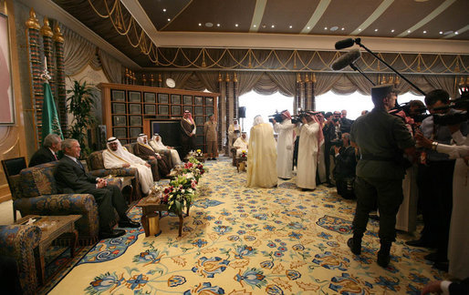 President George W. Bush and King Abdullah bin Abdulaziz are the center of attention as they sit for photographs Friday, May 16, 2008, during the arrival ceremony for the President and Mrs. Laura Bush at Riyadh-King Khaled International Airport in Riyadh. White House photo by Joyce N. Boghosian