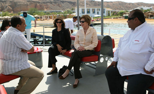 Mrs. Laura Bush listens to Dr. Mohamed Salem, Head of the South Sinai Protectorates, Egyptian Environmental Affairs Agency, as they prepare to depart for a coral reefs and ocean conservation tour Saturday, May 17, 2008, in Sharm el Sheikh, Egypt. Joining them are Ms. Hilda Arellano, USAID Cairo Mission Director, and Mr. Amir Ali, Hurghada Environmental Protection and Conservation Association. White House photo by Shealah Craighead
