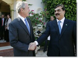 President George W. Bush and the Pakistan Prime Minister Yousaf Raza Gilani shake hands following their meeting Sunday, May 18, 2008, in Sharm El Sheikh, Egypt. White House photo by Joyce N. Boghosian