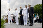 Vice President Dick Cheney poses for a photograph with a U.S. Coast Guard Academy graduate, Wednesday, May 21, 2008, during commencement exercises in New London, Conn. White House photo by David Bohrer