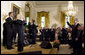 President George W. Bush stands for the Cuban national anthem Wednesday, May 21, 2008, during a Day of Solidarity with the Cuban People in the East Room of the White House. Scheduled to coincide with a period in Cuban history that marks Cuban Independence Day, the death of Jose Marti and the death of Pedro Luis Boitel, the day seeks to focus international attention on the denial of fundamental freedoms to the Cuban people. White House photo by Joyce N. Boghosian