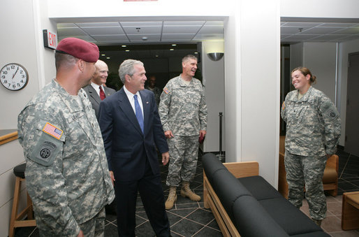 President George W. Bush talks with soldiers during his tour of the 82nd Airborne Division barracks rooms and facilities Thursday, May 22, 2008 in Fort Bragg, N.C., on his visit to attend the 82nd Airborne Division review. White House photo by Chris Greenberg