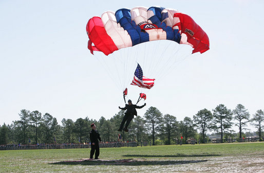 A member of U.S. Army's 82nd Airborne Division parachute team lands on the parade field during the President George W. Bush's visit Thursday, May 22, 2008 to Fort Bragg, N.C., on the occassion of the 82nd Airborne Division Review. White House photo by Chris Greenberg