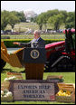 President George W. Bush delivers remarks in recognition of World Trade Week Friday, May 23, 2008, on the South Lawn of the White House. President Bush is seen with an array of products manufactured or grown in the United States. White House photo by Joyce N. Boghosian