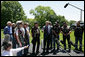 President George W. Bush stands with National Executive Director of Rolling Thunder Artie Muller and other members as he gives a statement to the press about the importance of the work the motorcycle riders do on behalf of the military. White House photo by Chris Greenberg