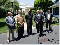 President George W. Bush speaks to reporters with NCAA head football coaches, from left to right, Jack Siedlecki of Yale University, Mark Richt of the University of Georgia, Randy Shannon of the University of Miami, Tommy Tuberville of Auburn University and Charlie Weis of the University of Notre Dame on Monday, May 26, 2008, at the White House. President Bush welcomed the coaches who were recently returning from visiting troops in the Middle East. White House photo by Chris Greenberg