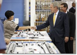 President George W. Bush greets an employee during his visit to Silverado Cable Company in Mesa, Arizona, Tuesday, May 27, 2008. White House photo by Eric Draper