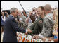 President George W. Bush meets with military personnel prior to departing the New Century Aircenter in Olathe, Ks., Thursday, May 29, 2008, for his trip back to Washington, D.C. White House photo by Eric Draper