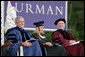 President George W. Bush shares a laugh with Furman University Student Commencement Speaker Meredith Neville and the Chairman of Furman University Board of Trustees Carl Kohrt during commencement ceremonies for the Class of 2008 at Furman University in Greenville, SC. White House photo by Chris Greenberg