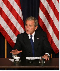 President George W. Bush delivers remarks during a drop-by meeting on the economy and tax cuts Monday, June 2, 2008, in the Dwight D. Eisenhower Executive Office Building in Washington, D.C. President Bush said during his remarks, "The best way to deal with economic uncertainty is to let people have more of their own money, because we believe that the economy benefits when there's more money in circulation, in the hands of the people who actually earned it."  White House photo by Joyce N. Boghosian