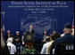 President George W. Bush addresses the audience during groundbreaking ceremonies Thursday, June 5, 2008, for the United States Institute of Peace Headquarters Building and Public Education Center at Navy Hill in Washington, D.C. The U.S. Institute of Peace is a congressionally funded foreign affairs education, training and operational organization.  White House photo by Chris Greenberg