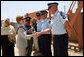 Mrs. Laura Bush greets New Zealand Police officers Sunday, June 8, 2008, during her visit to the Police Training Academy in Bamiyan, Afghanistan. Mrs. Bush traveled to Afghanistan to highlight the continued U.S. commitment to the country and its President Hamid Karzai. White House photo by Shealah Craighead