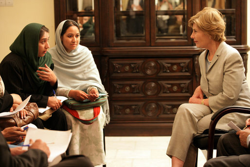 Mrs. Laura Bush speaks with faculty and students from Afghan universities and international schools, Sunday, June 8, 2008, during an unannounced visit to Kabul. Attending the meeting were representatives from Kabul University, American University of Afghanistan, International School of Kabul and the Women's Teacher Training Institute. White House photo by Shealah Craighead