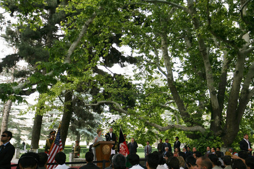 Under the boughs of the trees of Gul Khana Palace, Mrs. Laura Bush delivers remarks Sunday, June 8, 2008, during a press availability with President Hamid Karzai of Afghanistan in Kabul. White House photo by Shealah Craighead