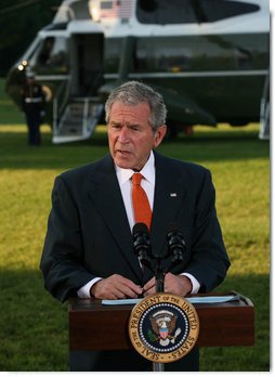 President George W. Bush speaks to the media before departing the South Lawn of the White House for Andrews Air Force Base en route to Europe for a weeklong visit during which he will address a variety of issues with counterparts in Slovenia, Germany, Italy, Vatican City, France and the United Kingdom. Said the President, "The U.S. economy has continued to grow in the face of unprecedented challenges. We got to keep our economies flexible; both the U.S. economy and European economies need to be flexible in order to deal with today's challenges. I'm looking forward to my trip."  White House photo by Joyce N. Boghosian