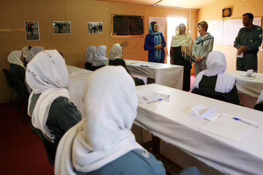 Mrs. Laura Bush and Governor Habiba Sarabi, in white, meet with female police trainees who will graduate June 15th from Non-Commissioned Officer Training during a visit Sunday, June 8, 2008, to the Police Training Academy in Bamiyan, Afghanistan. White House photo by Shealah Craighead
