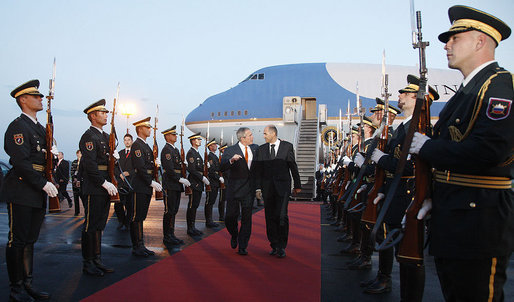 President George W. Bush walks through an honor cordon with Prime Minister Janez Jansa of Slovenia after arriving Monday, June 9, 2008, at Ljubljana International Airport on the first stop of his European visit. White House photo by Eric Draper