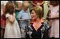 Mrs. Laura Bush talks to children during her visit to the United States Embassy Tuesday, June 10, 2008, in Kranj, Slovenia. White House photo by Chris Greenberg
