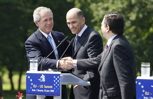 President George W Bush shakes hands with Janez Jansa, Prime Minister of Slovenia, and Jose Manuel Barroso, President of the European Commission, following the United States - European Union Meeting Tuesday, June 10, 2008, at Brdo Castle in Kranj, Slovenia. White House photo by Eric Draper