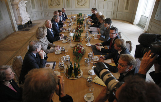 President George W. Bush sits across from Chancellor Angela Merkel during an expanded meeting Wednesday, June 11, 2008, at Schloss Meseberg, the Chancellor's retreat near Berlin. White House photo by Eric Draper