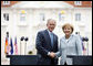 President George W. Bush and Germany's Chancellor Angela Merkel shake hands after participating in a joint press availability Wednesday, June 11, 2008, at Schloss Meseberg in Meseberg, Germany. White House photo by Eric Draper