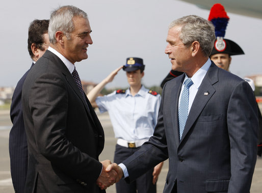 President George W. Bush shakes hands with U.S. Ambassador to Italy Ronald Spogli after arriving Wednesday, June 11, 2008, at Ciampino International Airport in Rome. White House photo by Eric Draper