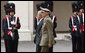President George W. Bush, escorted by Italian General Rolando Mosca Moschini, passes the Guardia D'Onore Thursday, June 12, 2008, on his departure from Quirinale Palace in Rome. White House photo by Eric Draper