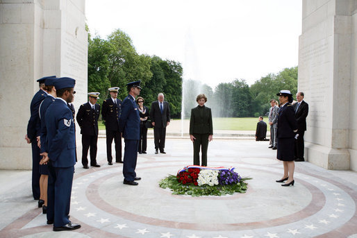 Mrs. Laura Bush pauses for a moment of silence after laying a wreath at the Lafayette Escadrille Memorial Wednesday, June 11, 2008, in Marnes la Coquette, France. White House photo by Shealah Craighead