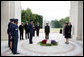 Mrs. Laura Bush pauses for a moment of silence after laying a wreath at the Lafayette Escadrille Memorial Wednesday, June 11, 2008, in Marnes la Coquette, France. White House photo by Shealah Craighead