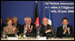 Mrs. Laura Bush joins in the applause during the International Conference in Support of Afghanistan Thursday, June 12, 2008 in Paris, where Mrs. Bush addressed the conference urging continued support for the Afghanistan people to build civic and economic institutions that can withstand the forces of oppression. Mrs. Bush is joined on the panel, from left, Afghanistan Foreign Minister Dr. Rangin Dadfar Spanta, Afghanistan President Hamid Karzai and French President Nicholas Sarkozy. White House photo by Shealah Craighead