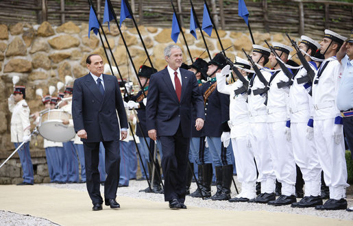 President George W. Bush is escorted by Italian Prime Minister Silvio Berlusconi during an honor guard review Thursday, June 12, 2008, at the Villa Madama in Rome. White House photo by Eric Draper