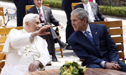 President George W. Bush listens as Pope Benedict XVI gestures as he talks about the Vatican Gardens Friday, June 13, 2008, at the Vatican. White House photo by Eric Draper