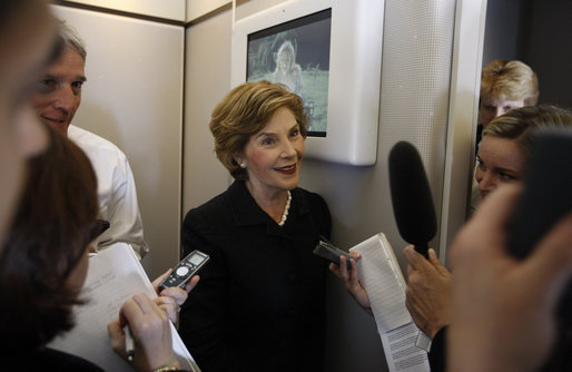 Mrs. Laura Bush speaks with members of the press June 13, 2008 aboard Air Force One, as she and President Bush travel from Rome to Paris on their multi-city European visit. White House photo by Eric Draper