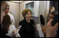 Mrs. Laura Bush speaks with members of the press June 13, 2008 aboard Air Force One, as she and President Bush travel from Rome to Paris on their multi-city European visit. White House photo by Eric Draper