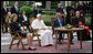 President George W. Bush and Mrs. Laura Bush meet June 13, 2008 in the Vatican Gardens with Pope Benedict XVI and Vatican Secretary of State Cardinal Tarcisio Bertone, where they watch the performance of The Pontifical Sistine Choir. White House photo by Shealah Craighead