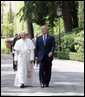 President George W. Bush joins Pope Benedict XVI on a walk through the Vatican Gardens Friday, June 13, 2008 at the Vatican. White House photo by Chris Greenberg