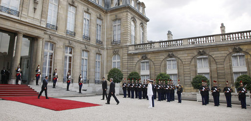 President George W. Bush is welcomed by French President Nicolas Sarkozy for a dinner Friday evening, June 13, 2008, at the Elysee Palace in Paris. White House photo by Eric Draper