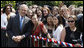 President George W. Bush poses for photos during his greeting with members of the U.S. Mission in France, Saturday, June 14, 2008, at the Ambassador's residence in Paris. White House photo by Eric Draper