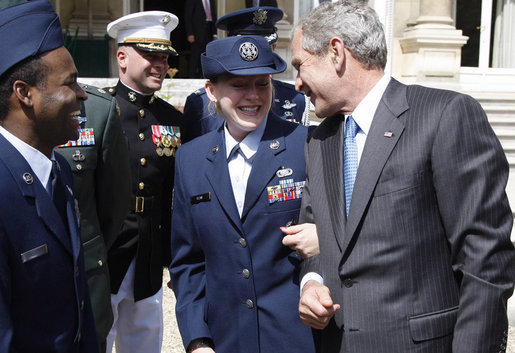 President George W. Bush spends a moment speaking with U.S. military personnel during the greeting with members of the U.S. Mission in France, Saturday, June 14, 2008, at the Ambassador's residence in Paris. White House photo by Eric Draper