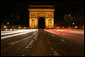 Traffic passes by the Arc de Triomphe in Paris early Saturday morning, June 14, 2008. White House photo by Chris Greenberg