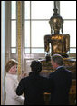 Mrs. Laura Bush is shown a statue during her tour of the Afghani and Burmese Collections at the British Museum in London on Monday, June 16, 2008. White House photo by Shealah Craighead