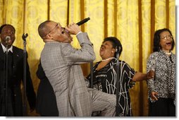 Singer Walter Hawkins performs on stage in the East Room of the White House, where he was joined on stage by his brother, Edwin, Tuesday, June 17, 2008, in honor of Black Music Month.  White House photo by Eric Draper