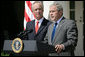 As U.S. Interior Secretary Dirk Kempthorne looks on, President George W. Bush delivers a statement on energy Wednesday, June 18, 2008, in the Rose Garden of the White House. Calling on Congress to expand domestic oil production, the President said, "For many Americans, there is no more pressing concern than the price of gasoline. Truckers and farmers and small business owners have been hit especially hard. Every American who drives to work, purchases food, or ships a product has felt the effect. And families across our country are looking to Washington for a response." White House photo by Luke Sharrett