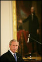 President George W. Bush welcomes guests Thursday evening, June 19, 2008 to the East Room of the White House, during a social dinner in honor of American jazz. White House photo by Chris Greenberg